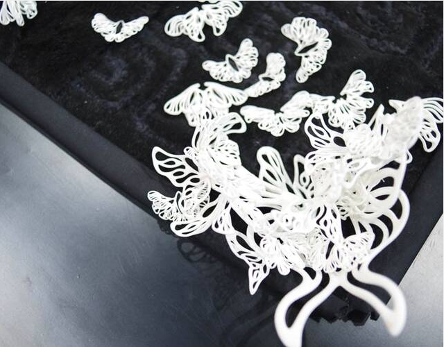 白色树脂3D打印出的各类饰品